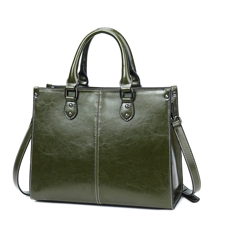Front view of the Oil Wax Stitch Leather Handbag in green.