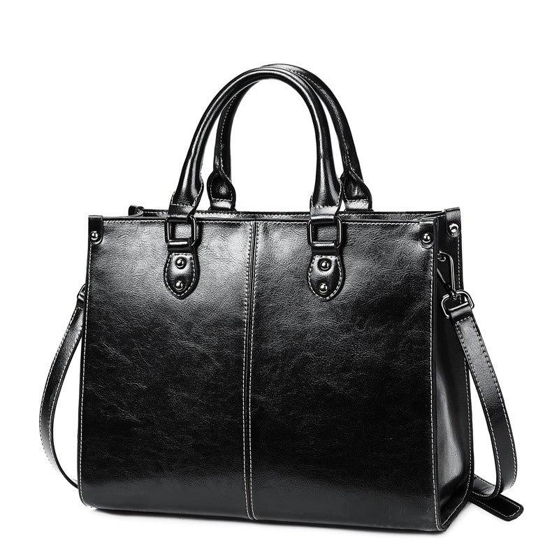 Front view of the Oil Wax Stitch Leather Handbag in black.